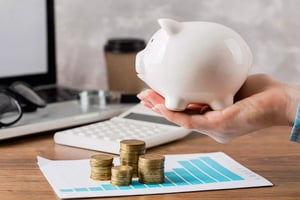 hand-holding-piggy-bank