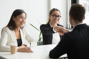women-handshaking